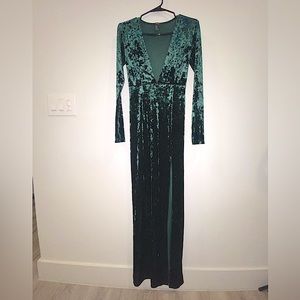 Emerald green deep cut maxi length dress